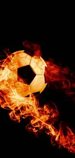 Dynamic fiery soccer ball with flames on black background.