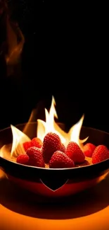 Fiery strawberries in a bowl with flames against a dark background.