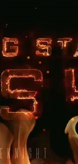 Fiery glowing text on a dark background with flames at the bottom.