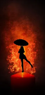 Silhouette with umbrella against a fiery red flame background.