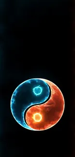 Fiery Yin Yang mobile wallpaper with blue and orange energy symbols.