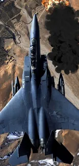 F-15 Eagle flying over desert landscape, captured from above.