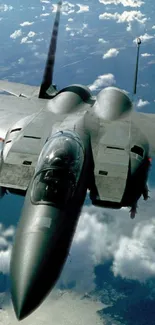 A sleek fighter jet soaring through a cloudy sky.