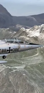 Fighter jet soaring above snow-capped mountains.