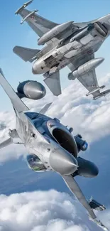 Two fighter jets soaring amid blue sky and clouds.