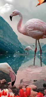 Pink flamingos by a serene lake with mountains.