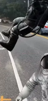 Surreal astronaut floating over road with trees and car in background.