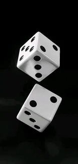 Floating white dice on black background wallpaper.