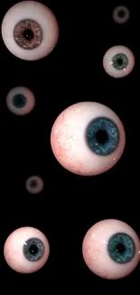 Floating eyeballs with a dark background for mobile wallpaper.