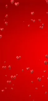 A vibrant red wallpaper with floating hearts design.