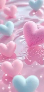 Pink and blue floating hearts on water background.