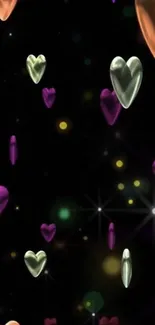 Colorful glowing hearts on a dark background mobile wallpaper.