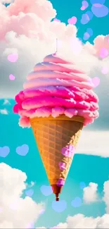 Pink ice cream cone floating among clouds in a vibrant blue sky.