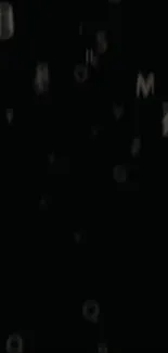 Abstract wallpaper with floating letters on black background.