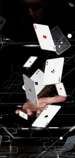 Floating playing cards with a black background.