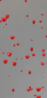 3D red hearts float on a gray background.