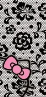 Black floral wallpaper with pink bow design.