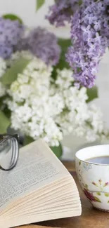 Mobile wallpaper with flowers, book, and tea.