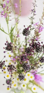 Vibrant floral bouquet with purple and white flowers on a soft background.