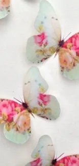 Beautiful floral butterflies on a light background creating an elegant mobile wallpaper.