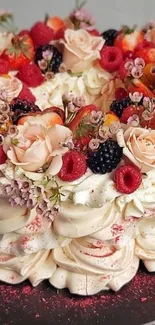 Cake with floral and fruit decorations in cream tones.