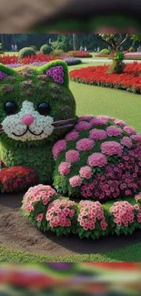 Floral cat sculpture in a garden setting with vivid pink and green flowers.