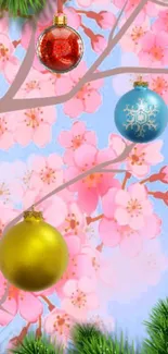 Pink cherry blossoms with Christmas ornaments on a mobile wallpaper.