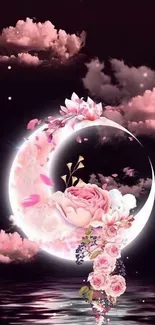 Floral crescent moon with pink flowers on water reflection.