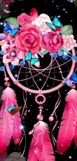 Dreamcatcher with pink flowers and blue butterflies.