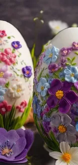 Decorative floral Easter eggs with purple and pink flowers.