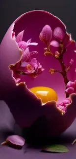 Pink eggshell with flowers and yolk on purple background.