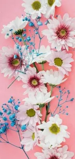 White and pink flowers on a pink background wallpaper.