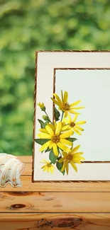 Floral frame with yellow flowers on a wooden table background.