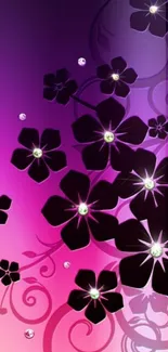 Vibrant floral glow wallpaper with pink and purple hues, featuring elegant flowers.