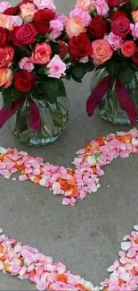 Romantic floral heart design with roses and pink petals.