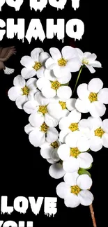 White flowers with love text on black background.