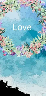 Floral wreath with 'Love' on a blue watercolor background.