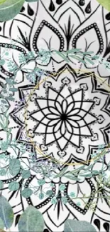 Intricate black and white mandala with floral accents in pastel blue and green.