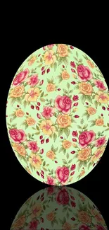 Mint green oval floral wallpaper with vintage roses on black background.