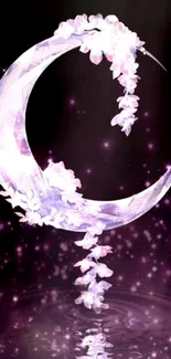 Mystical crescent moon with floral accents on a purple background.