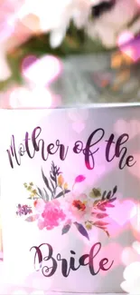 Mother of the Bride mug with pink floral design and heart background.