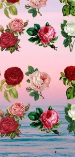 Elegant floral wallpaper with red roses and pink ocean waves.