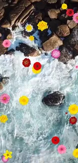 Vibrant flowers floating on ocean waves near rocks.