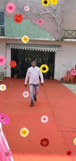 Man walking on red carpet with colorful flowers.