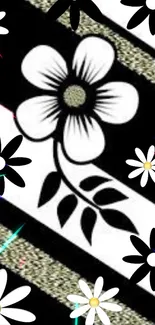 Black and white floral wallpaper with daisies and stripes.