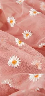 Pink sheer wallpaper with white daisies.