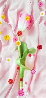 Pink tulip and flowers on soft pink fabric wallpaper.