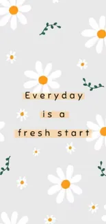 Floral phone wallpaper with daisies and motivational text.