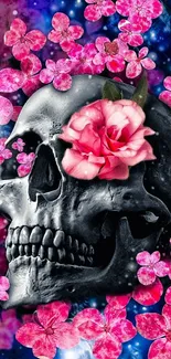 Dark floral skull wallpaper with pink blossoms.