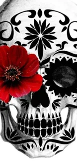 Artistic sugar skull with red flower for a unique wallpaper.